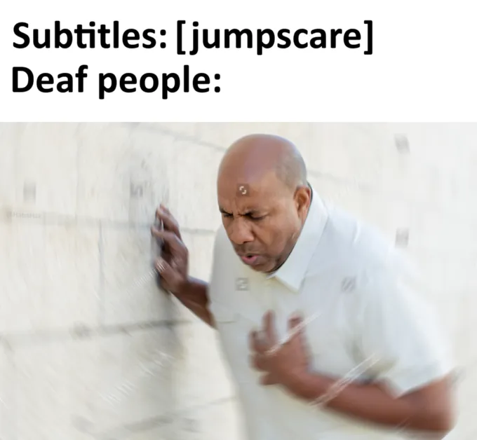 Meme: text reads “Subtitles: [jumpscare] / Deaf people:” over a man recoiling against a wall in motion blur