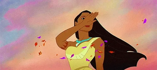 Animated gif of Pocahontas on a windy cliff with leaves swirling as she waves goodbye