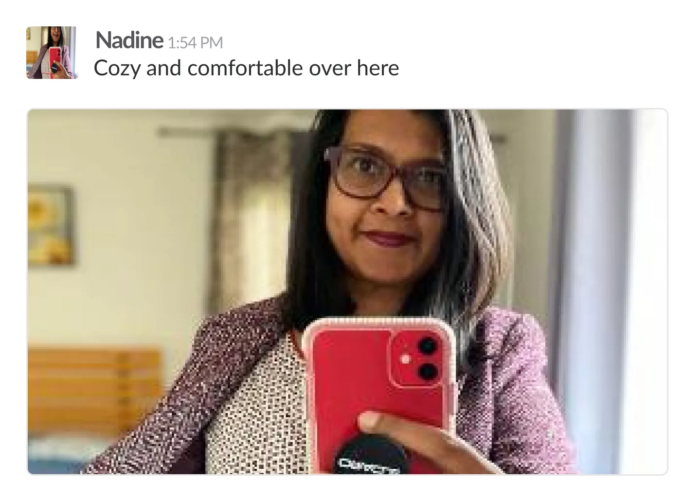 Nadine replying with a mirror selfie