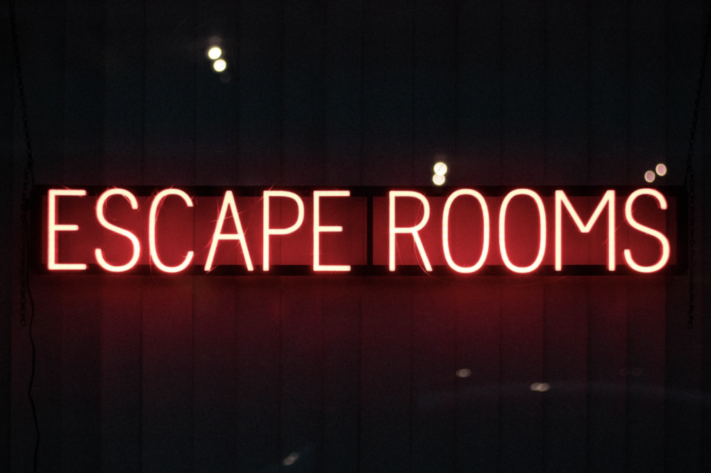 red escape rooms neon sign